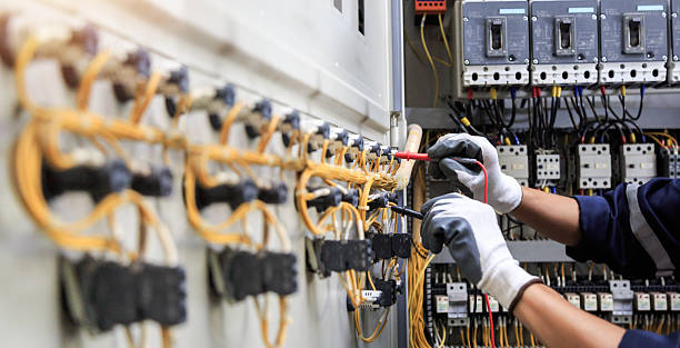 Professional Electrician technician working in Fargo, ND